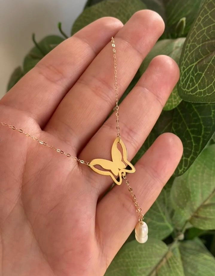 Collier papillon en Or18k avec johar naturelle