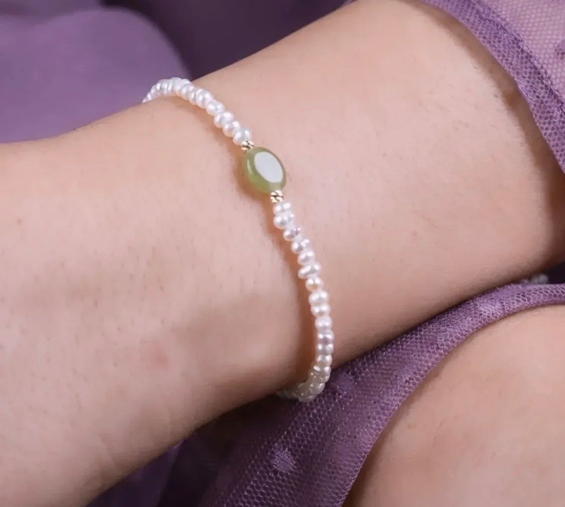 Bracelet jouhar naturelle avec deux boules en Or18k