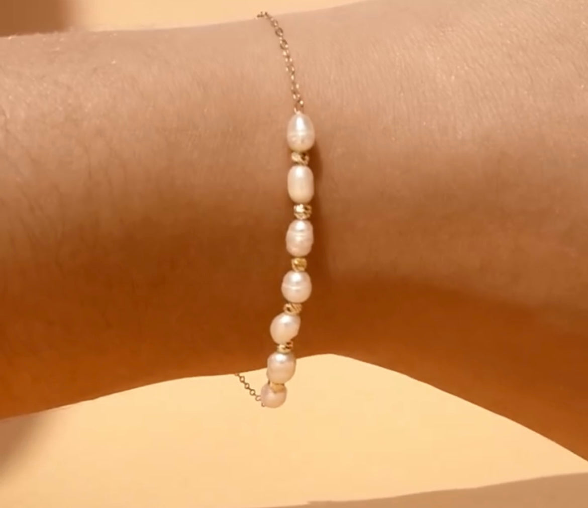 Gourmette perle boules en Or18k