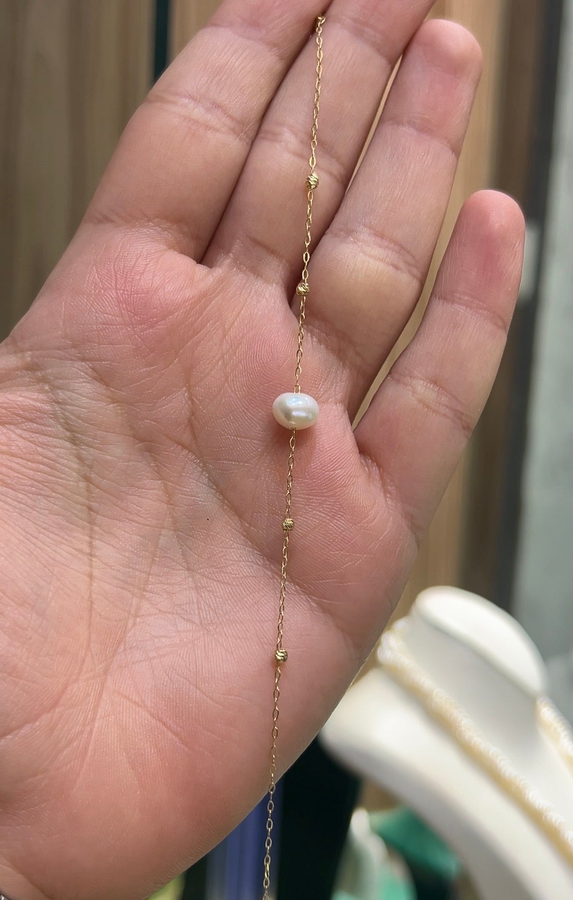 Gourmette en Or18k avec une perle naturelle