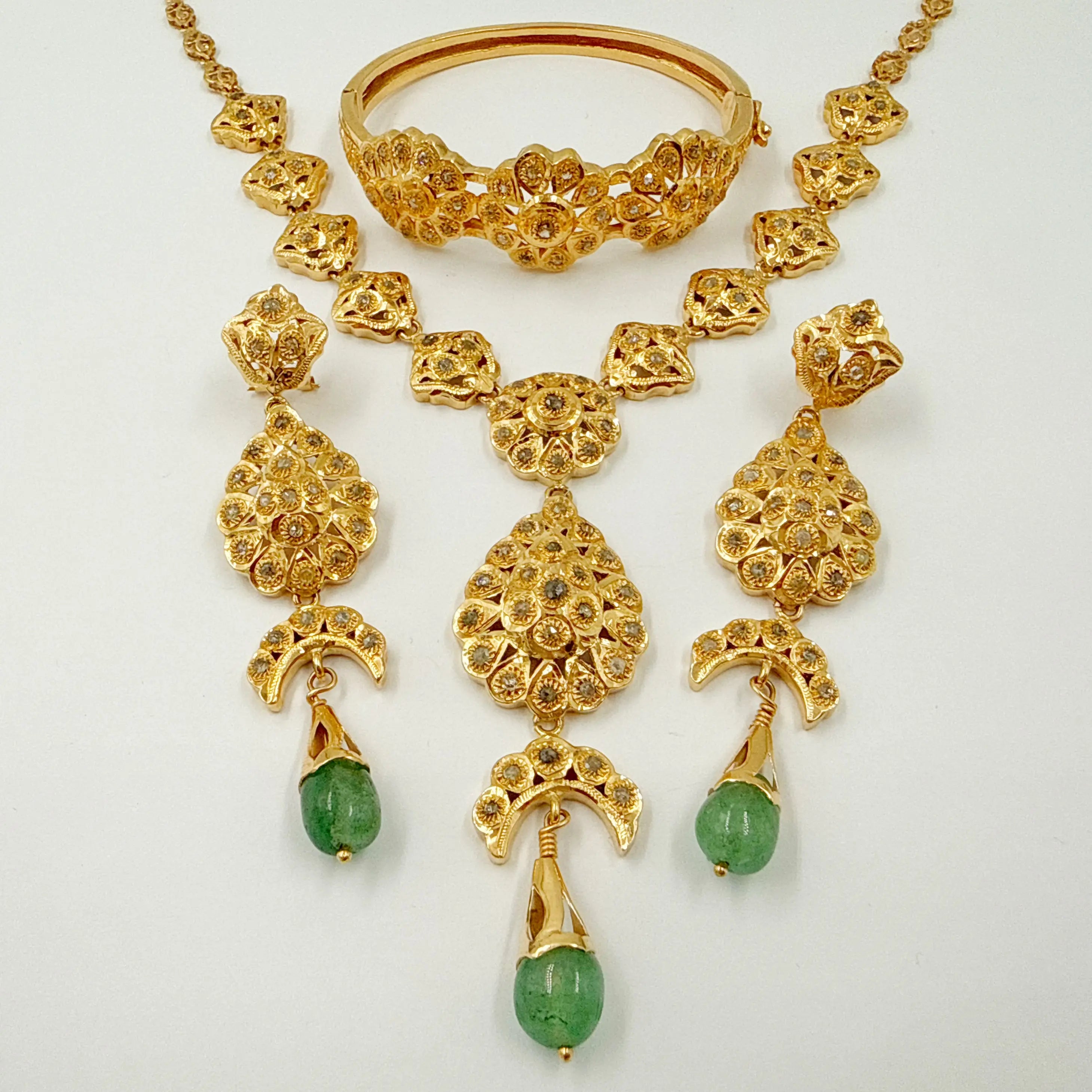 Parure traditionnelle en or rose avec motifs Louza, Hlala et Bellouta – Collier, boucles d'oreilles et bracelet