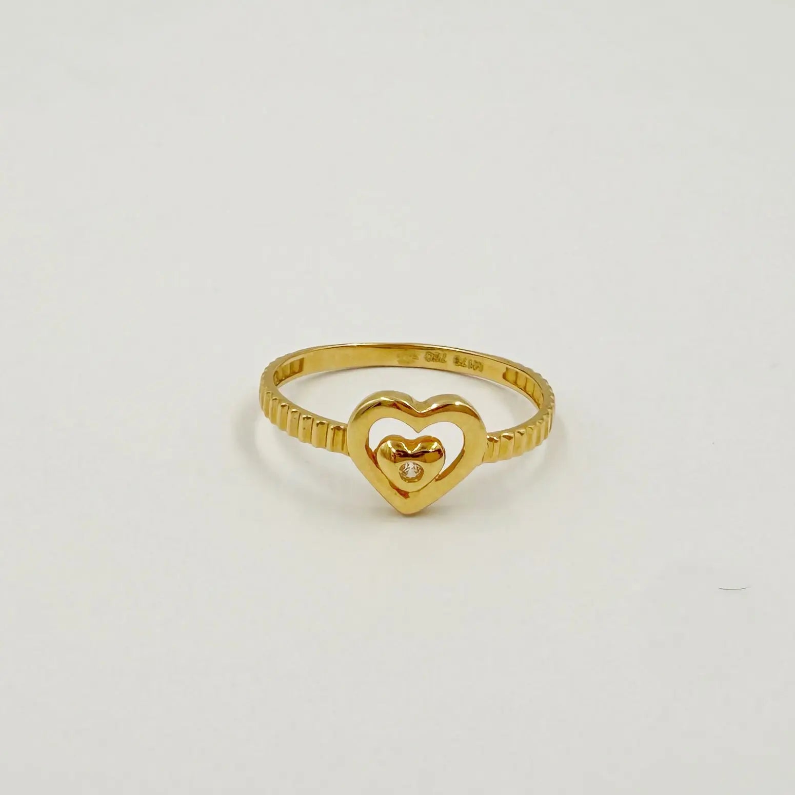 Bague en or jaune double cœur ajouré