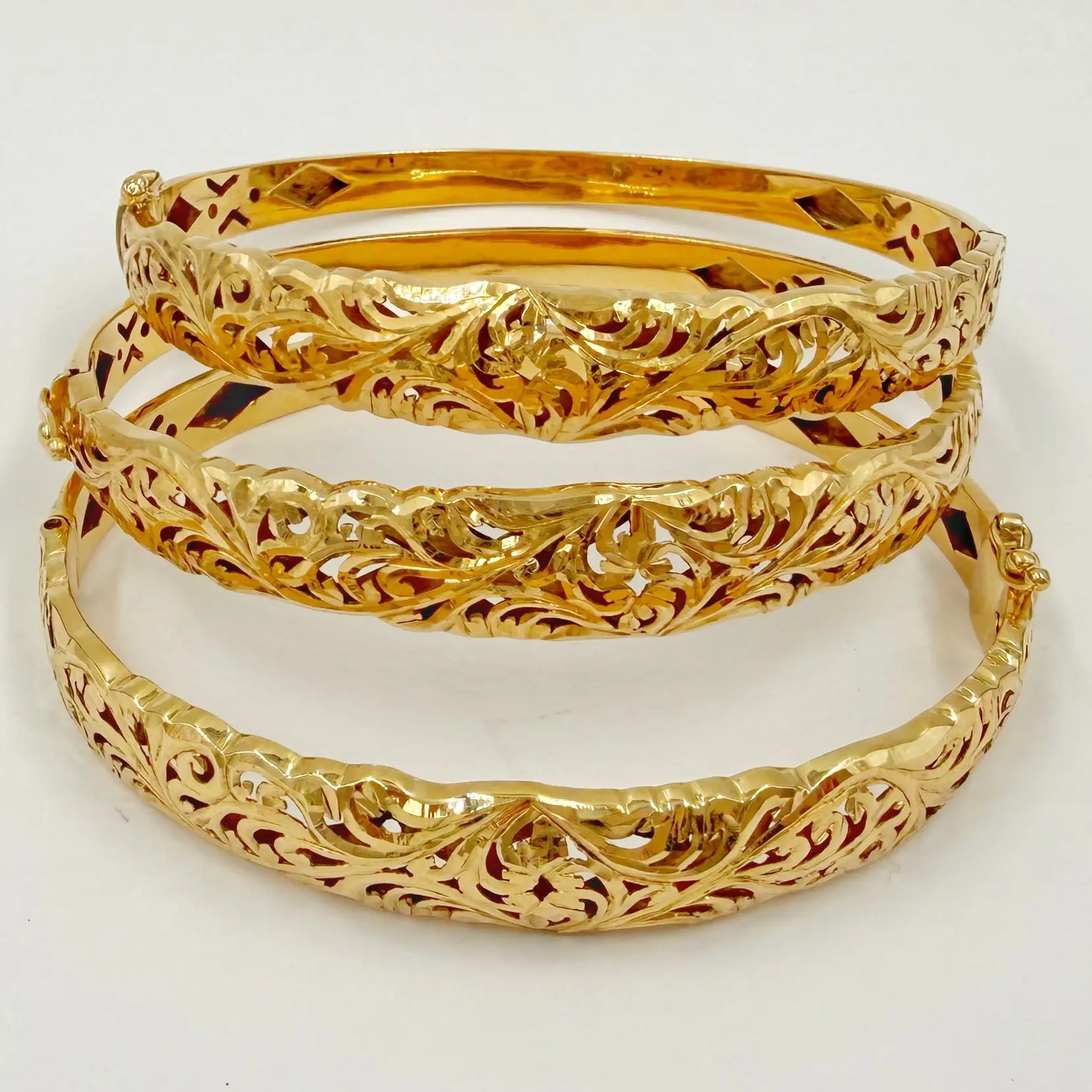 Lot de 3 bracelets traditionnels en or rose ajourés