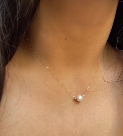 Collier en Or18k avec perle naturelle