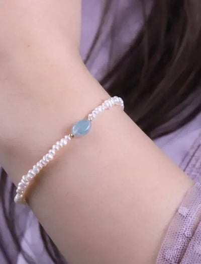 Bracelet jouhar naturelle avec deux boules en Or18k