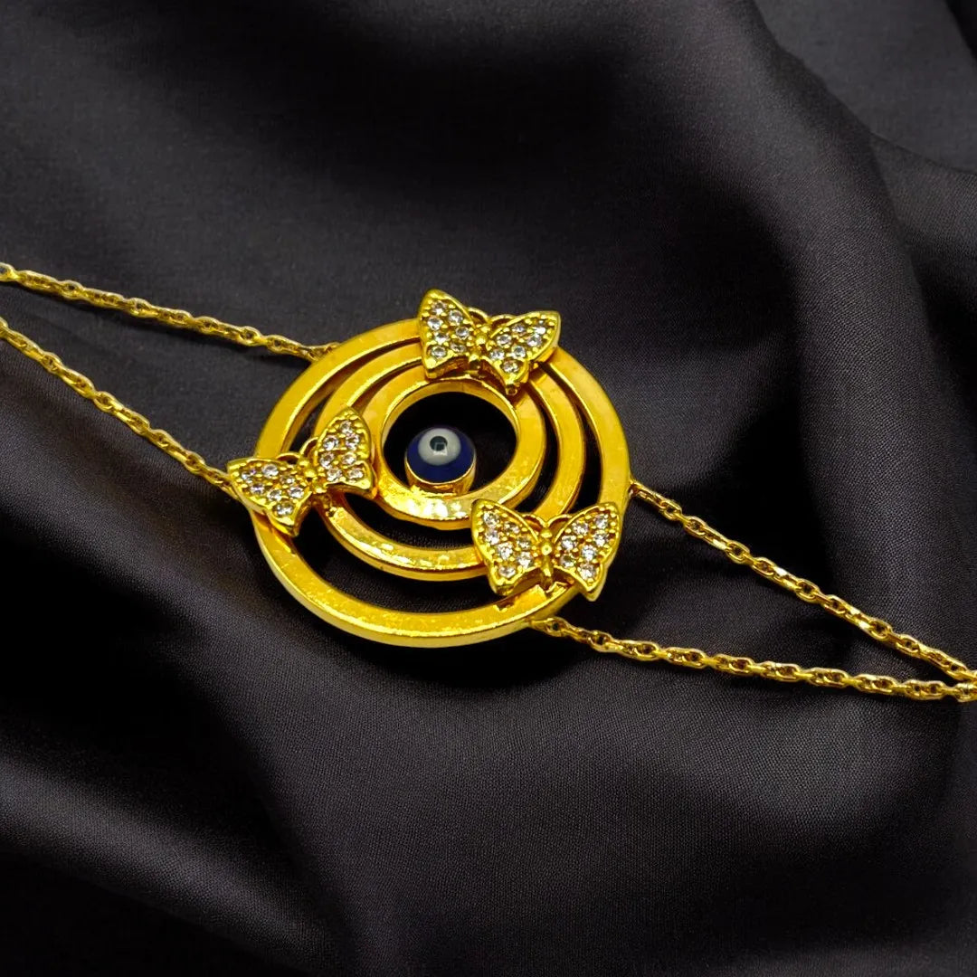 Gourmette avec Pendentif Œil Protecteur et Papillons