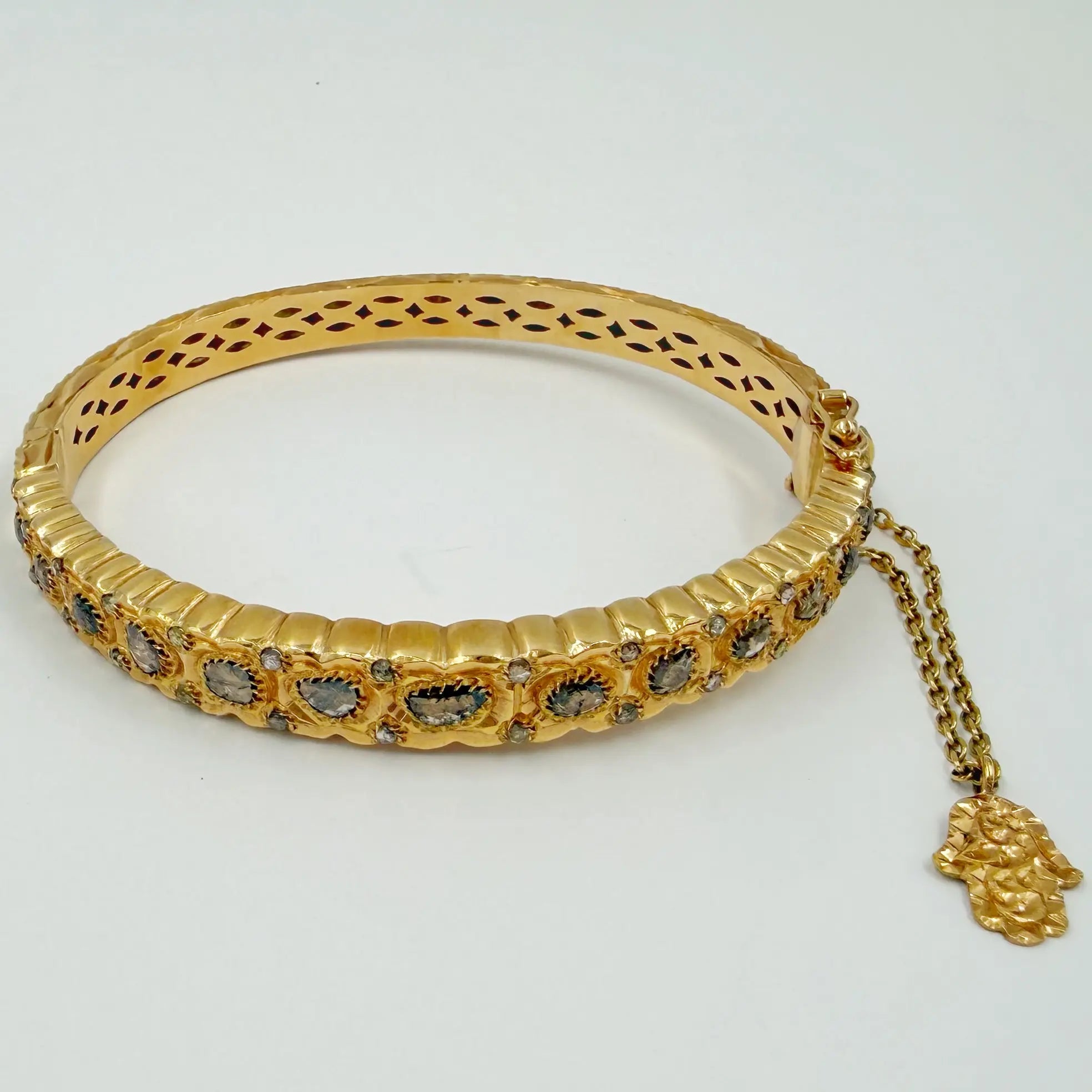 Bracelet traditionnel en or rose serti de rosaces