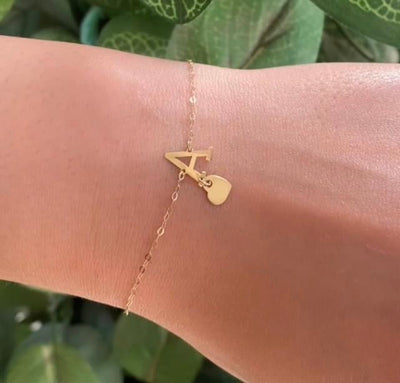 Gourmette lettre en Or18k