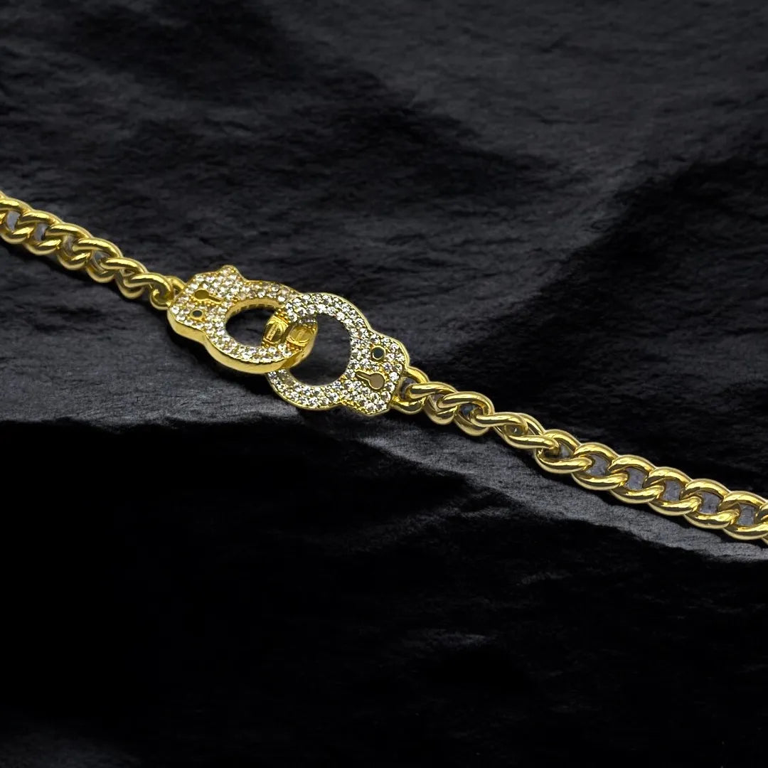 Gourmette en Or 18K avec Pendentif Menottes