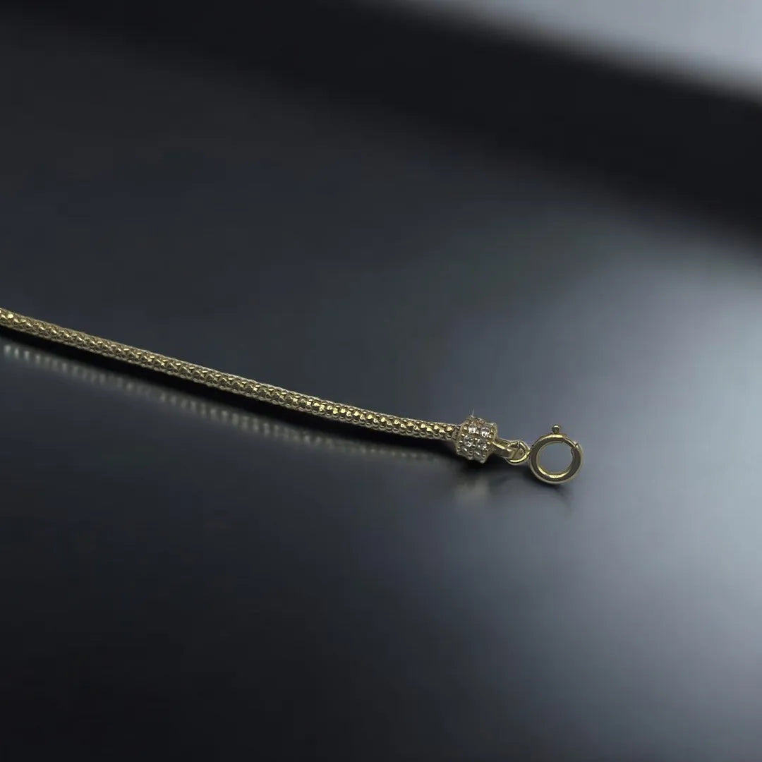 Gourmette avec Motifs Boules en Or 18K