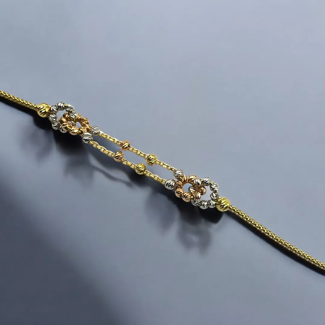 Gourmette avec Motifs Boules en Or 18K