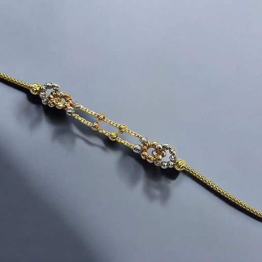 Gourmette avec Motifs Boules en Or 18K