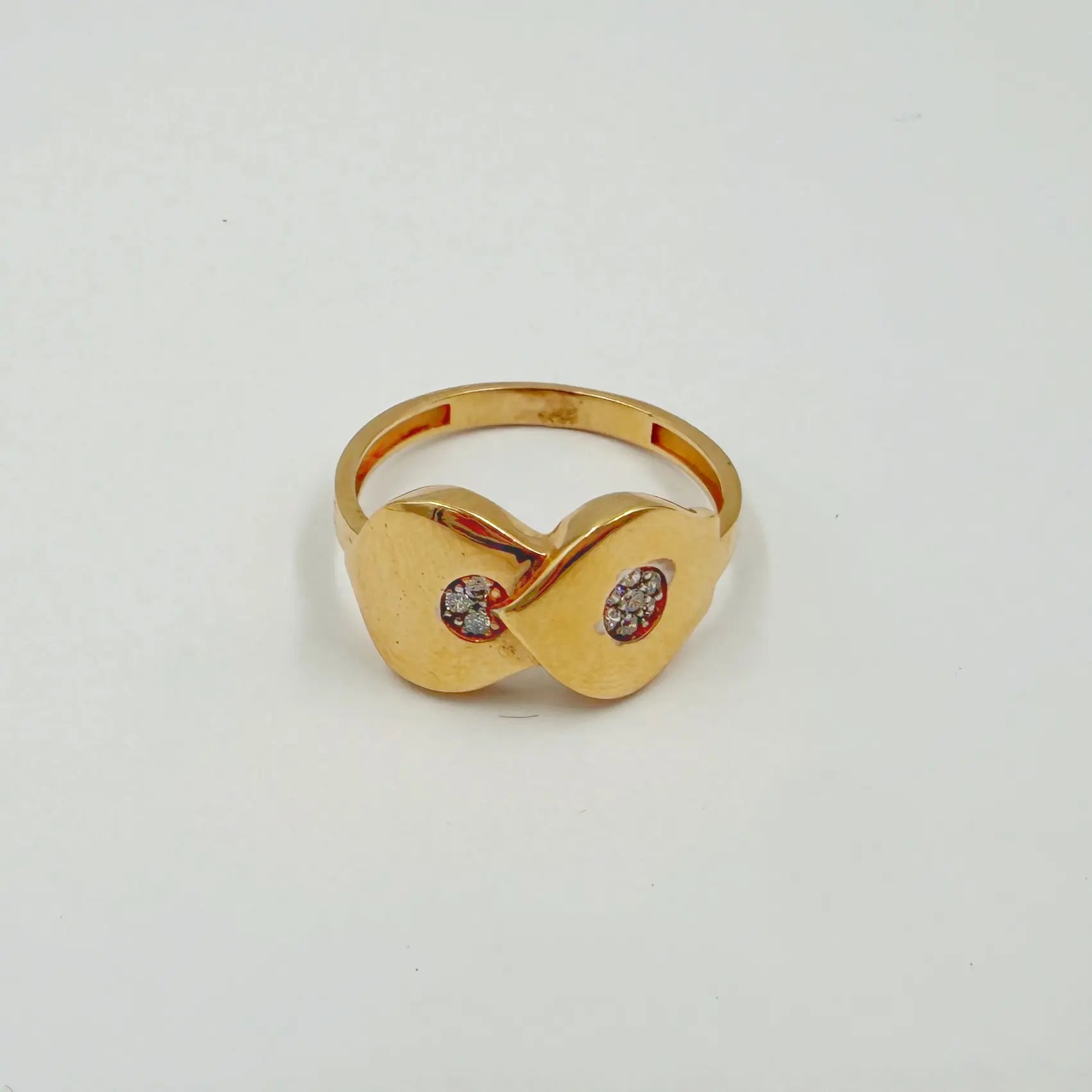 Bague en or rose à motif double