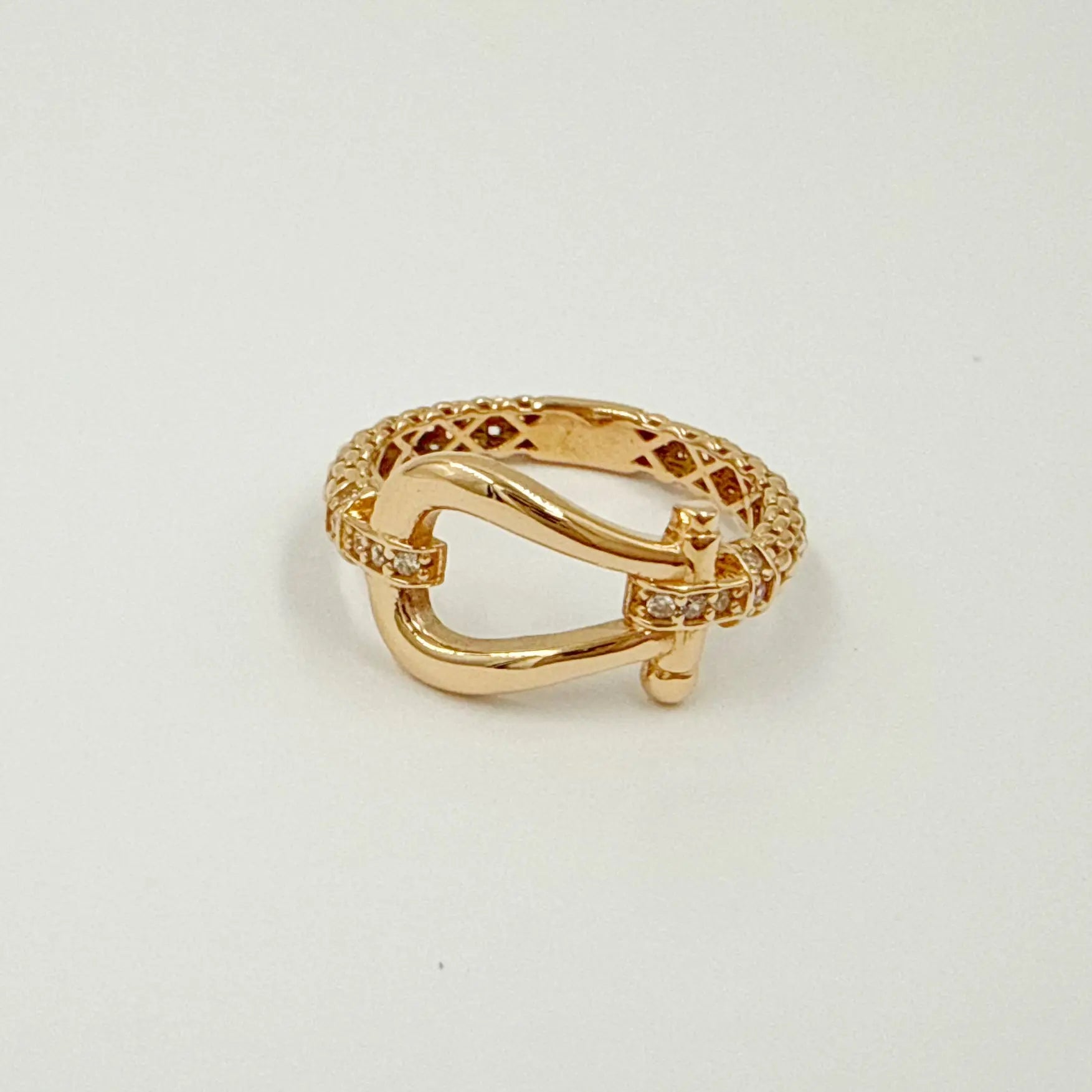 Bague en or rose 18 carats – Design entrelacé