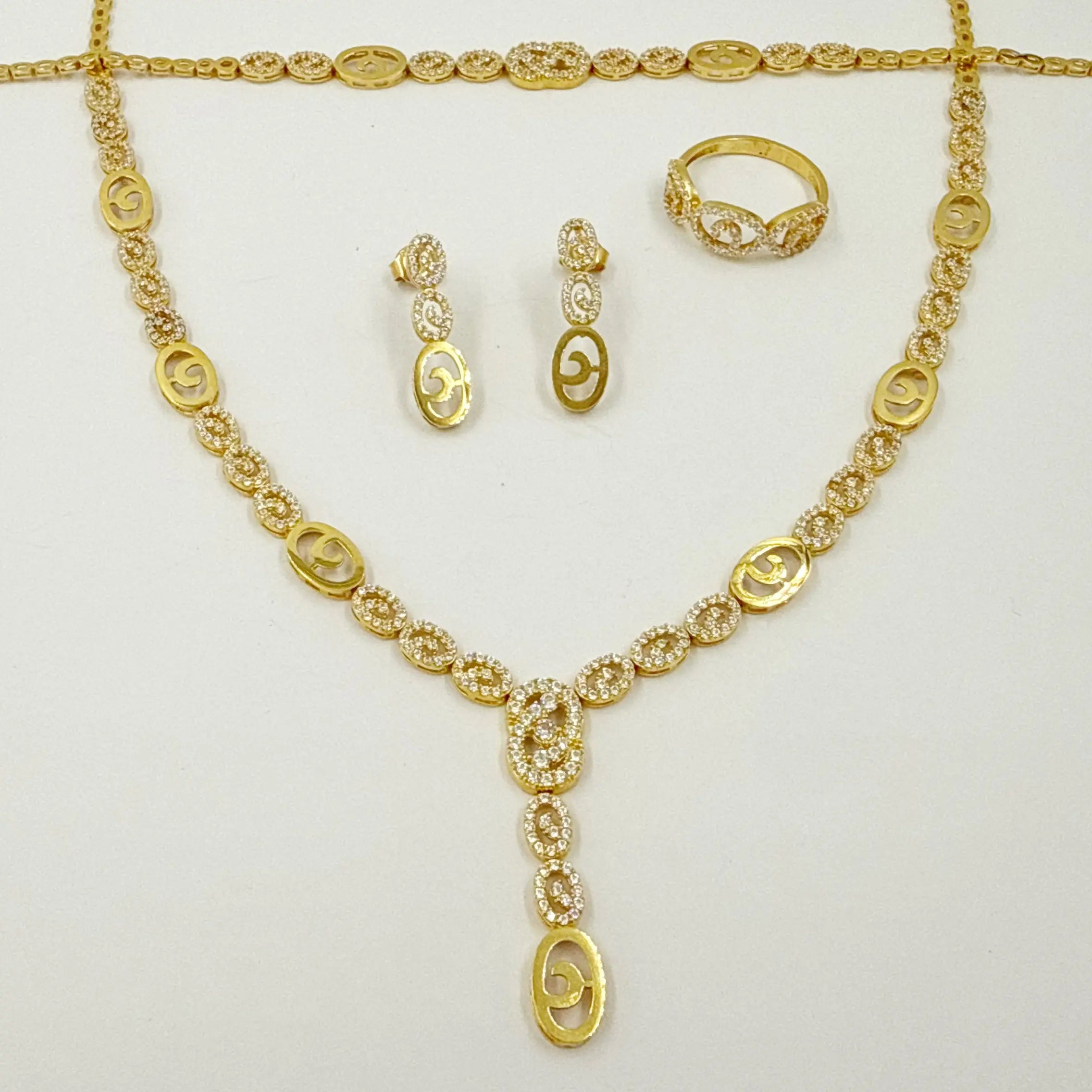 Parure moderne en or jaune – Collier, boucles d'oreilles, bague et gourmette motifs ovales ajourés [B.FETHI™]